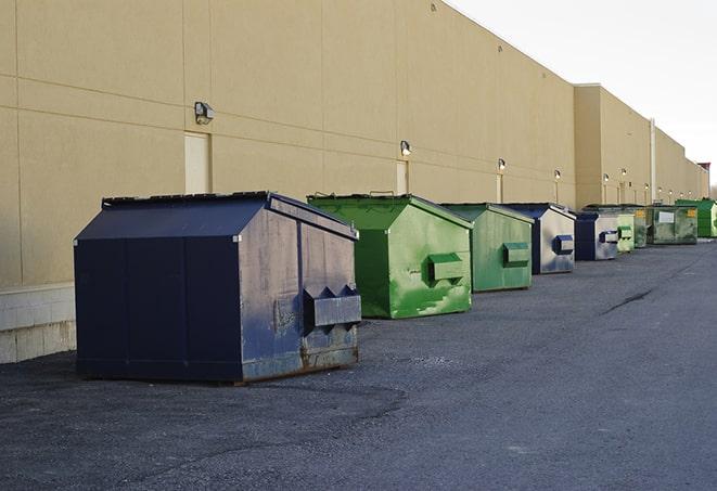 metallic dumpster units staged for construction garbage in Northbrook